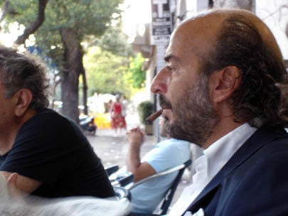 an elegant man with his morning coffee