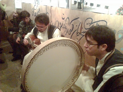 photo exhibition opening with sufi music