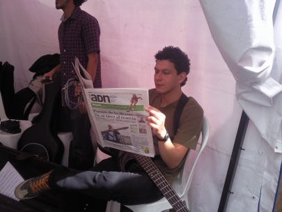 Julian getting informed before going on stage.